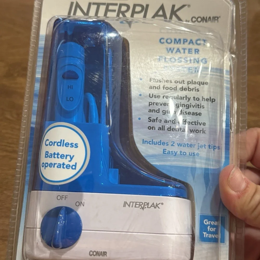 Interplak by Conair Compact Water Jet Flossing System Cordless Travel WJX Blue
